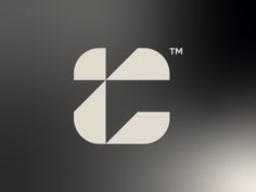 the letter c is made up of white and black letters on a dark background with an oval shape