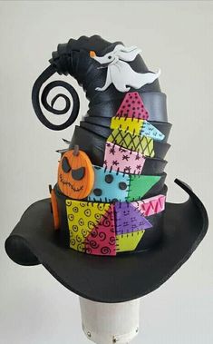 a black hat with halloween decorations on it