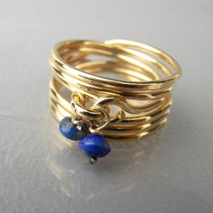 "Lapis Ring, Lapis Jewelry, Lapis Wire Wrapped Ring, Gemstone Ring, Turquoise Ring, Moonstone Ring, Blue Lapis Ring This gorgeous handmade twisted ring is made of 14K gold filled and natural Lapis bead connected to it. This ring is 100% handmade by me, and there is no ring similar to another. Each ring from this collection has its unique shape. * Please note - This ring is very delicate. We recommend only wearing it on special occasions, rather than on a daily basis. This ring can be customized Peridot Birthstone Ring, Wire Jewelry Rings, Lapis Jewelry, Blue Opal Ring, Wire Jewellery, Ring Moonstone, Swarovski Ring, Peridot Jewelry, Lapis Ring