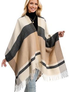 PRICES MAY VARY. Classic check Design: Embrace the check trend with this chic and stylish poncho sweater women, perfect for adding a touch of charm to any outfit.The shawl adorned with high-quality tassels that flutter with every step you take, adding a sense of fun and personality to your look Masterful Knitting Technique: Our shawl wraps constructed with careful attention to detail, Crafted from premium acrylic fibres, this ponchos for women winter is lightweight, and exceptionally soft and sk Women's Wraps And Shawls, Cape For Women, Travel Christmas Gifts, Cozy Shawl, Travel Christmas, Chilly Morning, Birthday Thanksgiving, Cozy Moments, Check Design