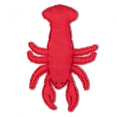 an embroidered red crab with two legs and one foot on it's back end