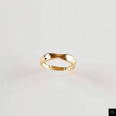 Celebrate Timeless Elegance with Our Gold Infinity Twist Ring Discover the beauty of simplicity and symbolism with our Gold Infinity Twist Ring. This dainty, handcrafted ring features a sleek twist design, symbolizing infinity and everlasting bonds. Made from certified solid gold, its minimalist aesthetic makes it a versatile accessory for both everyday wear and special occasions. Whether you're searching for a wedding gift, engagement gift, or a thoughtful Christmas gift for her, the Gold Infin Thoughtful Christmas Gifts, Twist Ring, Handcrafted Rings, Engagement Anniversary, Minimalist Aesthetic, Christmas Gifts For Her, Ring For Women, Engagement Gifts, Favorite Jewelry