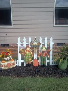 a group of lawn decorations in front of a house