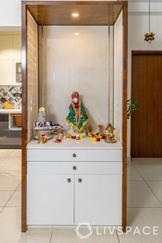 This 850 sq. ft. 2 BHK Flat in Bangalore is Stunning With Ample Storage Corner Wall Mounted Tv Ideas, Modern Wall Shelf, Pooja Room Design, Room Door Design, Puja Room, Wall Shelves Design