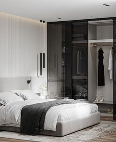 a bedroom with a bed and closets in it