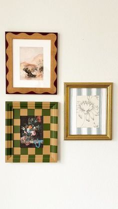 three framed pictures hang on the wall next to each other