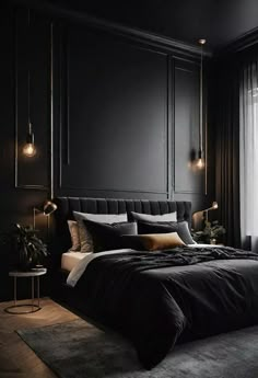 a bedroom with dark walls and black bedding, two lamps on either side of the bed