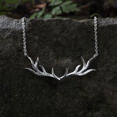 🔖 Please take a moment to go through the description below. It's important to understand the information provided, and it may also address some of your questions or concerns. Wrapped in the splendour of winter, this silver antler necklace is a celebration of natural beauty and the vitality of life. The Wilderness deer necklace is crafted to inspire its wearers to be valiant, seek out the vastness of life's journey, and draw near to the heart of nature. The antlers, emblematic of robustness, inspire its silhouette and tactile finish, evoking the deer's spirited essence. Also available in gold, please email for a quote. 📦 [Shipping] * Made to order * Please allow 3-5 working days for your order to be crafted and dispatched 🌟 [Features] * Perfectly balancing nature's raw beauty with a touc Visualize Your Highest Self, Charcoal Hair, Deer Antlers Necklace, Red Weave, Deer Necklace, Antler Pendant, Antler Design, Antler Jewelry, Cute Tats