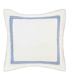 a blue and white pillow with a square border on the bottom, in front of a white background