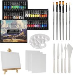 an assortment of art supplies including paint, brushes and canvass on a white background