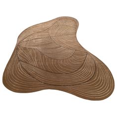 a brown hat with wavy lines on it