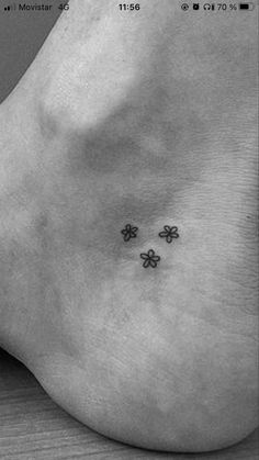 small four leaf clover tattoo on the ankle by movistar tattoos, via movistar