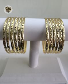 D/C Bangles Bracelet. 4mm in girth. Available in size: 2'', 2.1/4'', 2.5'', 2.3/4'', 3''. Sold by Dozen (12 pc). Choose the desired style. *Note* BGF=Brazilian Gold FilledBGO=Brazilian Gold Overlay Trinidad Gold Jewelry, 90s Gold Jewelry, Bangle Bracelets Gold, Xoxo Jewelry, Dope Jewelry Accessories, Brazilian Gold, Gold Bangle Set, Moroccan Jewelry, Bangles Gold