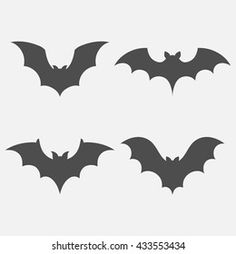 three bats silhouettes on a white background