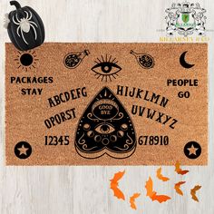 a door mat with the words and symbols on it