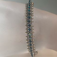 Handmade With Grey Leather Cord And Blue Rhinestone Cup Chain. Adjustable To Fit Any Size Wrist. Cup Chain Bracelet, Rhinestone Cups, Crystal Chain, Hand Crafted Jewelry, Crafted Jewelry, Blue Rhinestones, Blue Crystals, Grey Leather, Leather Cord