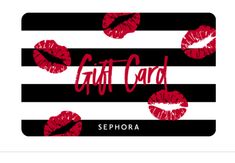 a gift card with red lipstick on black and white stripes