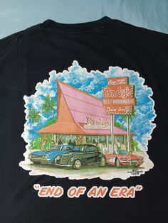 Very nice original 2000s Hawaii Nostalgia T-Shirt. EXACT MEASUREMENTS IN PICS AND LISTING. Very nice big back print. High quality original Alstyle tag. See pics for size and details! Approx. 20 X 29. Vintage 2000s Hawaii Nostalgia Andy's Beef Hamburger Drive In Surf Surfing Surfer Restaurant Vintage Car Roadster T-shirt Black M L Vintage Hibiscus Print Camp Shirt For Vacation, Vintage Hibiscus Print Beach Shirt, Restaurant Vintage, Vintage Tourist Shirt, Hawaiian Hibiscus Print T-shirt, Vintage Hawaii Postcard, Bad Drivers, Drive In, Recycled Fashion