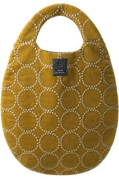 a yellow purse with circles on it