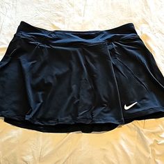 Brand New Women's Nike Tennis Skirt With Attached Shorts Nike Lined Skirt For Spring, Nike Spring Pleated Skirt, Nike Mini Skort, Nike Stretch Short Skort, Nike Fitted Mini Skort, Nike Short Lined Skirt, Nike Fitted Tennis Skirt, Flowy Skirt With Built-in Shorts, Nike Skirted Tennis Skirt With Lining