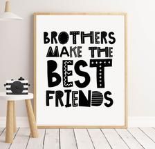 a black and white poster with the words brothers make the best friends on it next to a small table