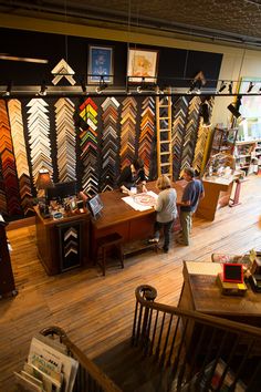 two people are standing in the middle of a store