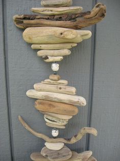 driftwood art hanging on the side of a door