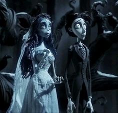 the corpse bride and groom are standing next to each other