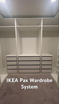 an ikea pax wardrobe system with drawers and shelves in the middle, all white