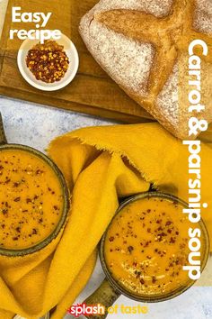 two bowls filled with soup next to bread on a cutting board