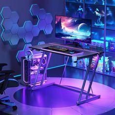 a computer desk with two monitors on it in front of hexagonal wallpaper