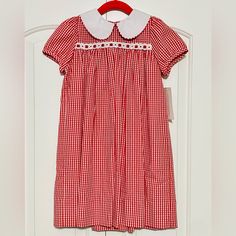 New With Tags. Has A Ribbon That Ties In The Back. Lightweight So A Great Back To School Piece Or Transitional Into Fall. The Dress Runs A Little On The Longer Side. Cute Red Dress For School, Cute Gingham Dresses For School, Preppy Red Cotton Dress, Red Preppy Cotton Dress, Preppy Gingham Dress For School, Cute Gingham School Dress, Cute Plaid Dresses For School, Red Short Sleeve School Dress, Plaid Short Sleeve Dress For School