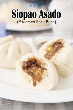 2 siopao asado and siopao sauce with 1 siopao cut in half showing pork asado filling. Pork Asado Siopao Recipe, Siopao Filling Recipe, Banh Bao Recipe, Siopao Dough Recipe, Siopao Asado Recipe, Siopao Recipe, Filipino Pork Recipes, Bao Recipe