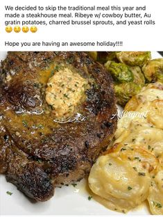 a white plate topped with steak, potatoes and brussel sprouts