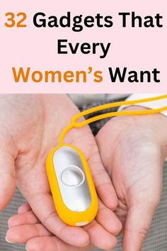 a woman's hand holding an electronic device with the text, 32 gadgets that every women's want