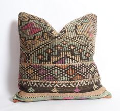 a decorative pillow with an interesting pattern on it