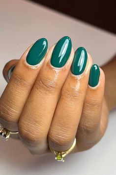 Add a touch of elegance with these stunning Glossy Deep Emerald Oval Nails 💅🌟 The deep emerald hue and sleek, shiny finish create a modern and sophisticated look that's perfect year-round. Get ready to make a statement with this classic and vibrant nail choice! // Photo Credit: Instagram @thegelbottlenz Emerald Nails Almond Shape, Shiny Emerald Green Nails, Emerald Gel Nails, Fall Gel Nails Green, Green Solid Nails, Green Dipped Nails, Short Green Nails Acrylic, Emerald Green Acrylics, Nail Ideas Dark Green