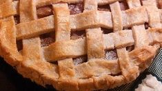 an apple pie sitting on top of a table