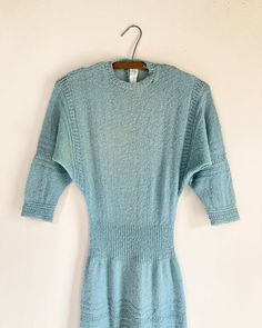 "An authentic vintage boucle knit batwing sweater dress. era : 1950s material : 100% wool color : blue condition : great! appropriate signs of age and wear as seen in photos, laundered and ready to wear! size :  best fit xsmall small - please compare measurements below actual garment measurements : chest up to 36\" waist : up to 26\" hip : 36\" total length : 50\" - - - - - - - - - - - - - - - - - - - - - - - - - - - - - - - - - - - - - - - -  INTERNATIONAL SHIPPING AVAILABLE UPON REQUEST Craft Union does NOT accept returns or exchanges, all items are FINAL SALE Please consider the following prior to placing an order : Because measurements are provided, Craft Union does NOT grant refund/exchange requests if an item does not fit. We are always happy to assist interest buyers with any size/f Vintage Blue Knit Sweater, Vintage Textured Knit Sweater, Fashion Reference, Boucle Knit, Batwing Sweater, Vintage Knitting Patterns, Knit Sweater Dress, 1950s Fashion, Vintage Knitting