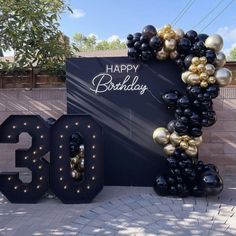 the 30th birthday sign is made out of balloons