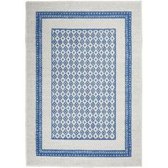 a blue and white rug on a white background