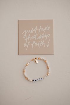 For we live by faith, not by sight. 2 Corinthians 5:7 Size: 6.75" one size fits most! Details: -beaded stretch bracelet -verse reference on attached gold tag -Display Card with artwork and details on back Inspirational Gold Beaded Bracelets, Faith Bracelet, Memorial Bracelet, I Know The Plans, Beaded Stretch Bracelet, Display Cards, Tag Necklace, Stretch Bracelets, Tags