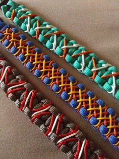 three bracelets that have different colors and designs on them