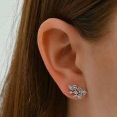 Mixed shape diamond cluster earrings are known for their contemporary yet elegant aesthetic. They make for a beautiful bridal accessory or can be worn for a chic occasion. Available in 14K White Gold Diamond weight = 1.66 carats Luxury Dazzling Cluster Earrings With Halo Setting, Luxury Diamond White Cluster Earrings With Halo Setting, Luxury Elegant Diamond Cut Cluster Earrings, Luxury Halo Cluster Jewelry, Luxury White Gold Cluster Earrings With Sparkling Stones, Luxury White Gold Gemstone Cluster Earrings, Luxury Oval White Gold Cluster Earrings, Luxury Gia Certified White Cluster Earrings, White Gold Luxury Drop Cluster Earrings