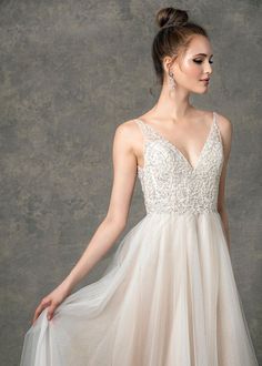 The Haven wedding dress has a v-neckline with floral bead work on bodice, A-line silhouette with layers of nude and sparkle tulle. #weddingdress #bridal #bridalgown #weddinggown #alineweddingdress #tulleweddingdress #sparkle #sparkletulle #handbeaded Wedding Dress Style, Wedding Dress Pictures