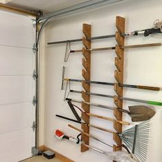 a garage with tools hanging on the wall