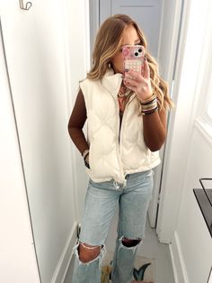 The most perfect pleather puffer vest!! This is a beige colored vest that has some embellishments on it!! This is the perfect elevated vest, easy to layer and easy to dress up or just to throw on over a sweatshirt!!! This is a true to size fit with a great length!! Cute Winter Outfits With Vest, Off White Vest Outfit, Women’s Puffer Vest Outfit, Cream Puffer Vest Outfit, Puffer Vest Outfits For Women, Outfits With Vest, White Vest Outfit, Puffer Vest Outfit, Vest Outfits For Women