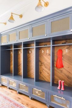 the lockers are painted blue and have wooden panels