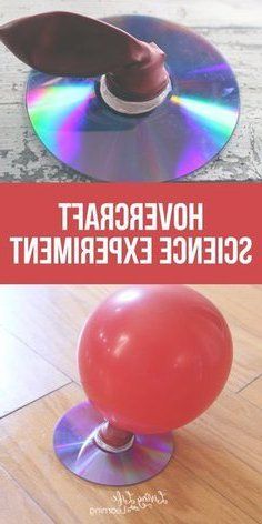 a red balloon sitting on top of a wooden floor next to a dvd disc with the words hovecraft science experiment