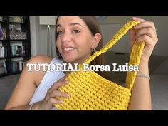 a woman holding up a yellow crocheted bag with the words,'how to knit